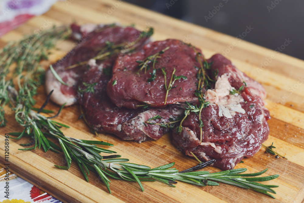 fresh beef meat on a cutting board