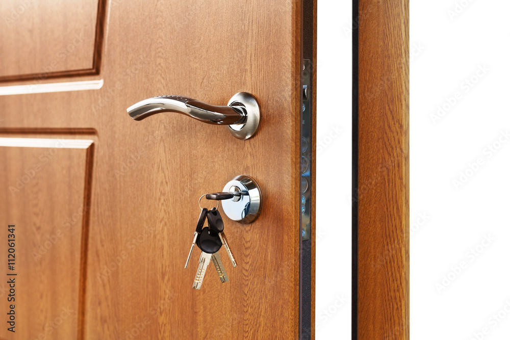 Open brown wooden door handle with lock. Open brown wooden door handle with lock.
