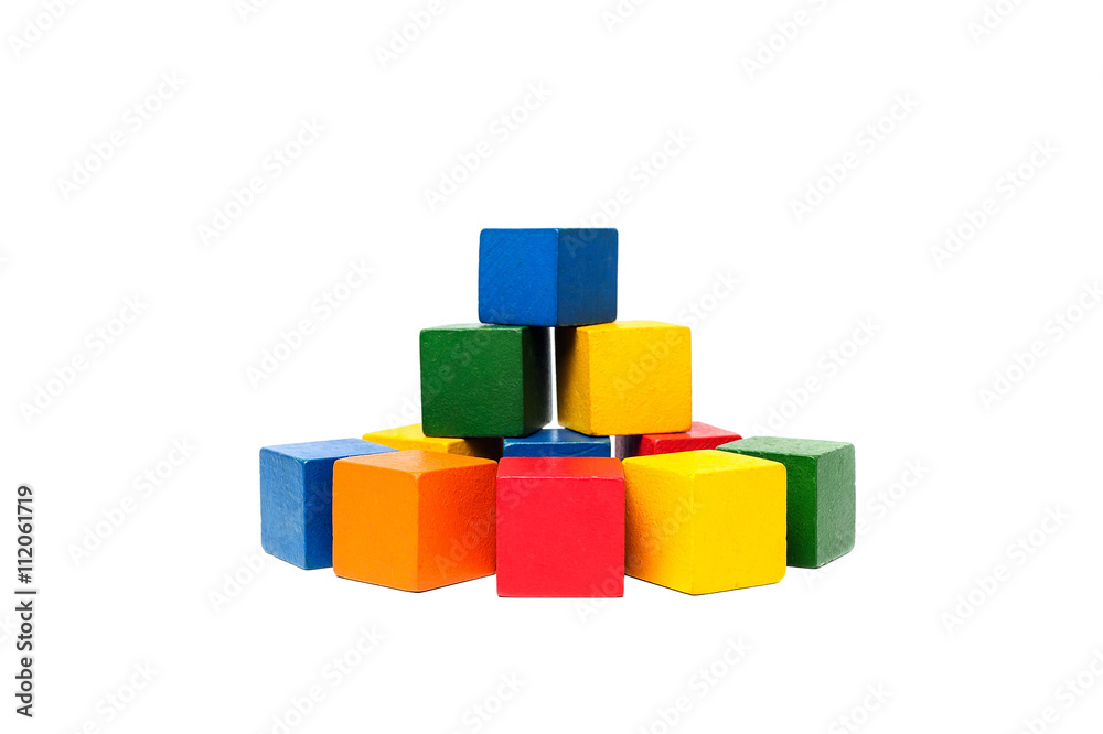 Wooden colorful building blocks isolated on white background. Cubes constructor. Vintage childrens toys. Wooden colorful building blocks isolated on white background. Cubes constructor. Vintage childrens toys.