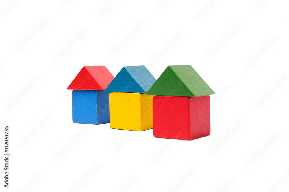 House made of old cubes. Wooden colorful building blocks isolated on white background. Vintage childrens toys. House made of old cubes. Wooden colorful building blocks isolated on white background. Vintage childrens toys.