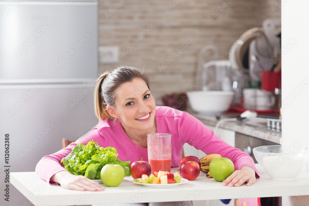 Healthy young woman enjoying in healthy food. Healthy young woman enjoying in healthy food.