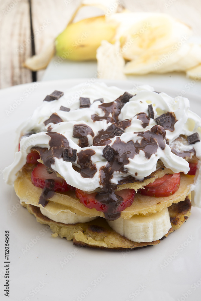 pancakes with strawberries, banana, blueberries and chocolate... pancakes with strawberries, banana, blueberries and chocolate...