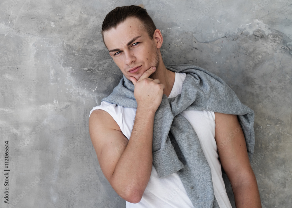 Portrait of a handsome young man, fashion mode Portrait of a handsome young man, fashion mode