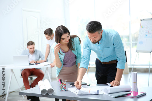 Group of young engineers wo...