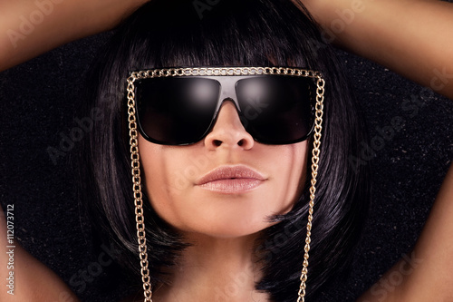 Portrait of sexy woman in sunglasses.