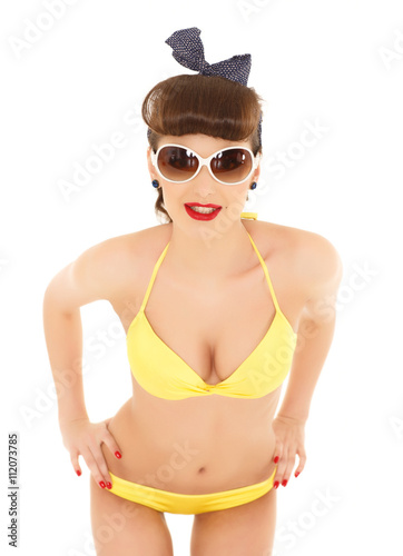 Woman in bikini with sunglasses.