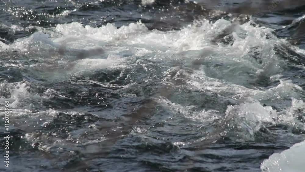 The flow of the mountain river. The Sayan mountains. Siberia. Russia.