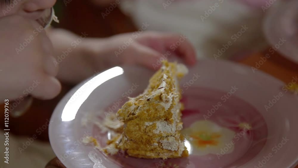 Little girl eating birthday cake Little girl eating birthday cake