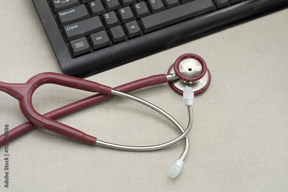 doctor stethoscope with keyboard showing digital healthcare doctor stethoscope with keyboard showing digital healthcare