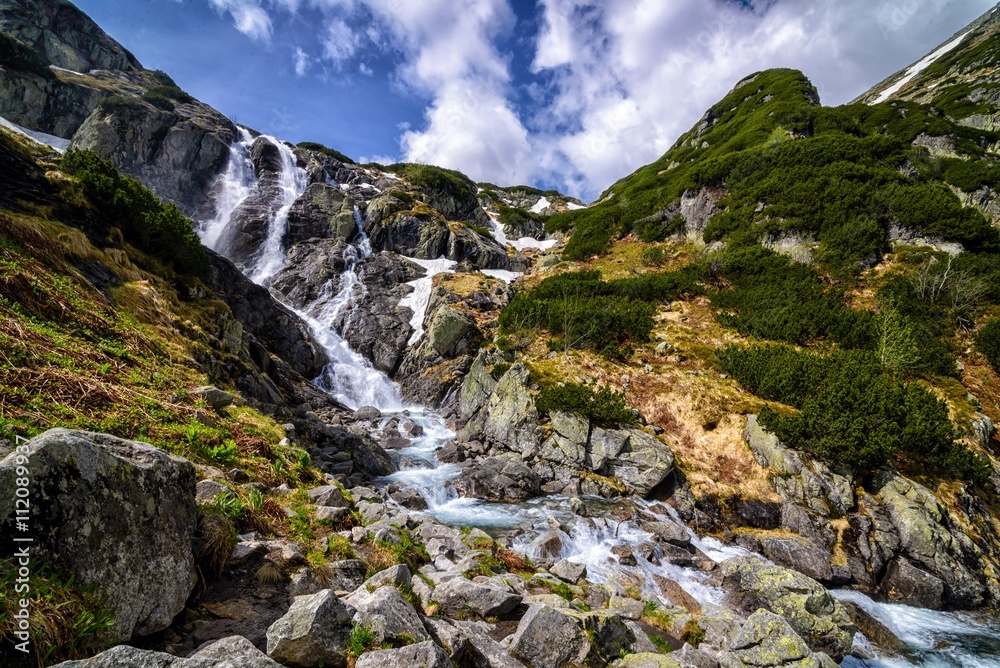 Mountain waterfall Siklawa in Polish Tatra Mountain waterfall Siklawa in Polish Tatra