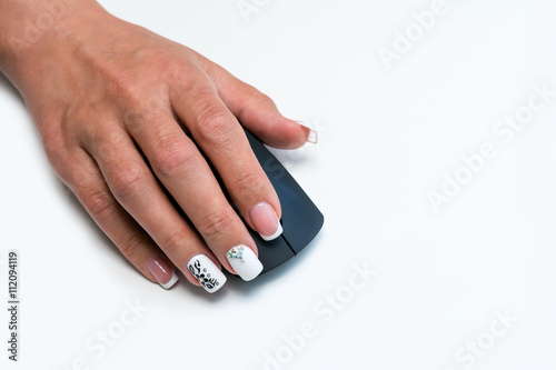 Woman s hand on computer mouse