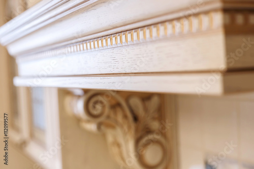 abstract background. element wood carving. furniture in classic style. carving. small depth of field. luxury furniture.