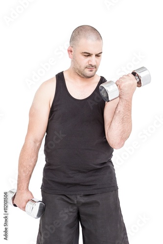 Bodybuilder lifting dumbbells