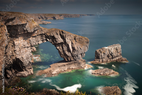 The Green Bridge of Wales, one of the UK's sea arches, one of the most spectacular sites on the Pembrokeshire Coast near Castlemartin. 