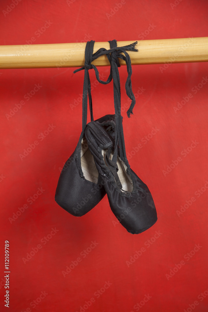 Ballet Shoes Hanging From Barre
