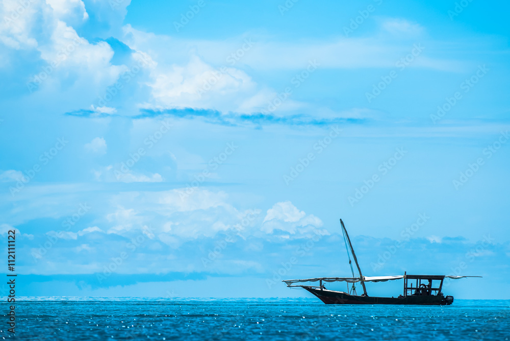 Traditional fishing boat sailing in Indian Ocean Traditional fishing boat sailing in Indian Ocean