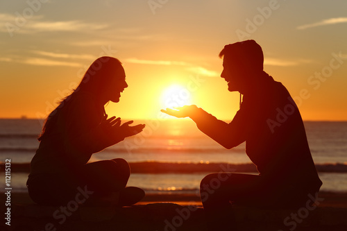 Couple dating falling in love at sunset