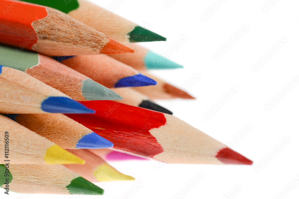 A lot of pencils with different color and red pencil in front A lot of pencils with different color and red pencil in front