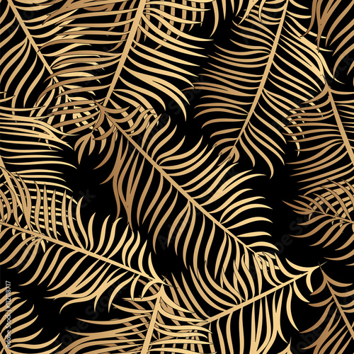 Seamless vector tropical pattern depicting golden palm tree on a black background