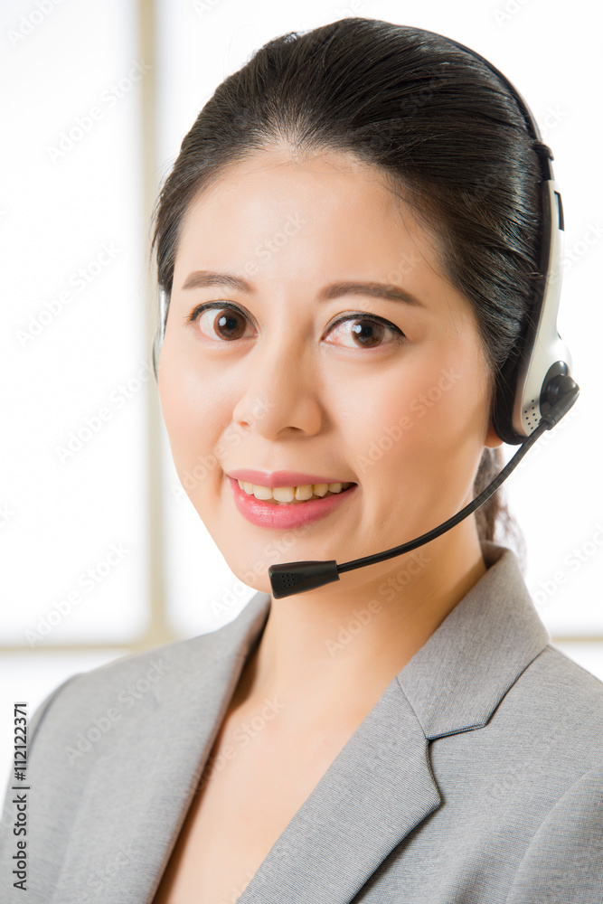 Beautiful asian business customer service woman smiling Beautiful asian business customer service woman smiling