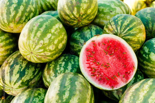 Group of fresh watermelons on market.