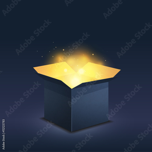 Fotografiet Blue box with magic golden light on dark