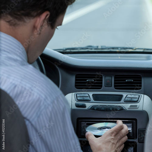 Inserting CD in the car