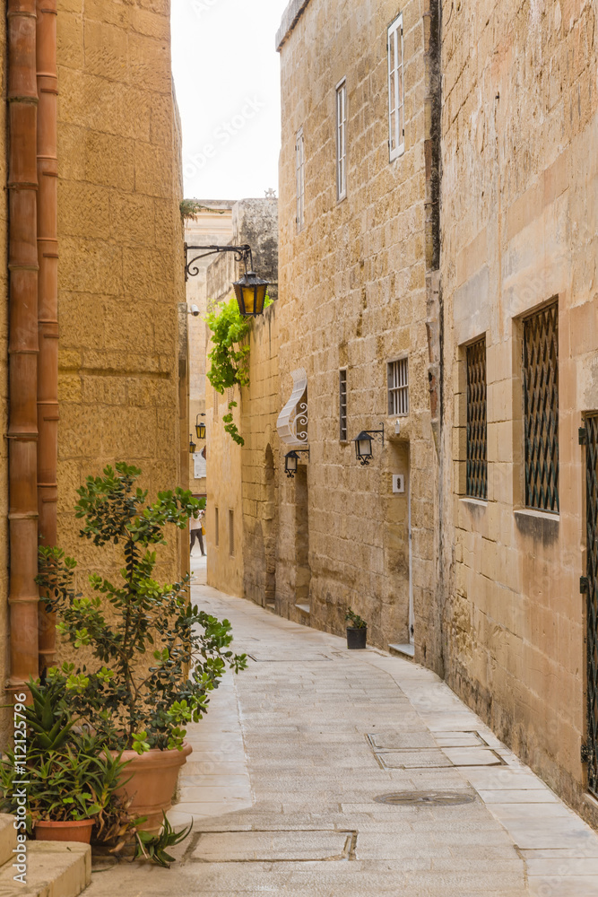 Silent and magical alley in Mdina, Malta