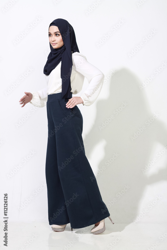 asian woman model posing on white wall asian woman model posing on white wall