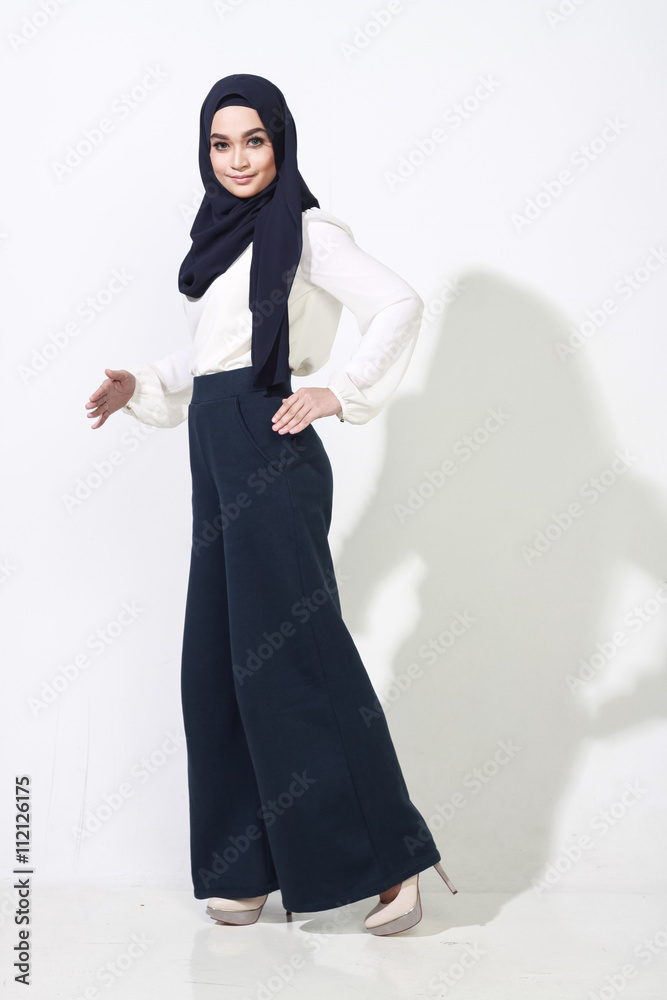 asian woman model posing on white wall asian woman model posing on white wall