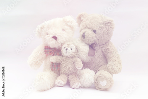 Family teddy bears with colorful filter, flare