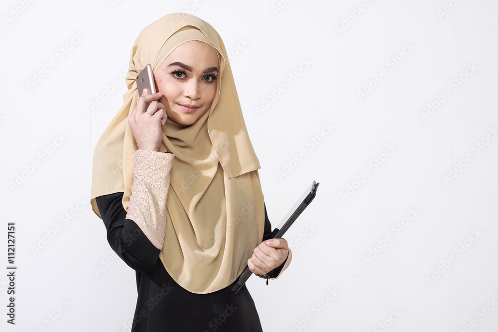 asian malay woman using tablet for bussines matter asian malay woman using tablet for bussines matter
