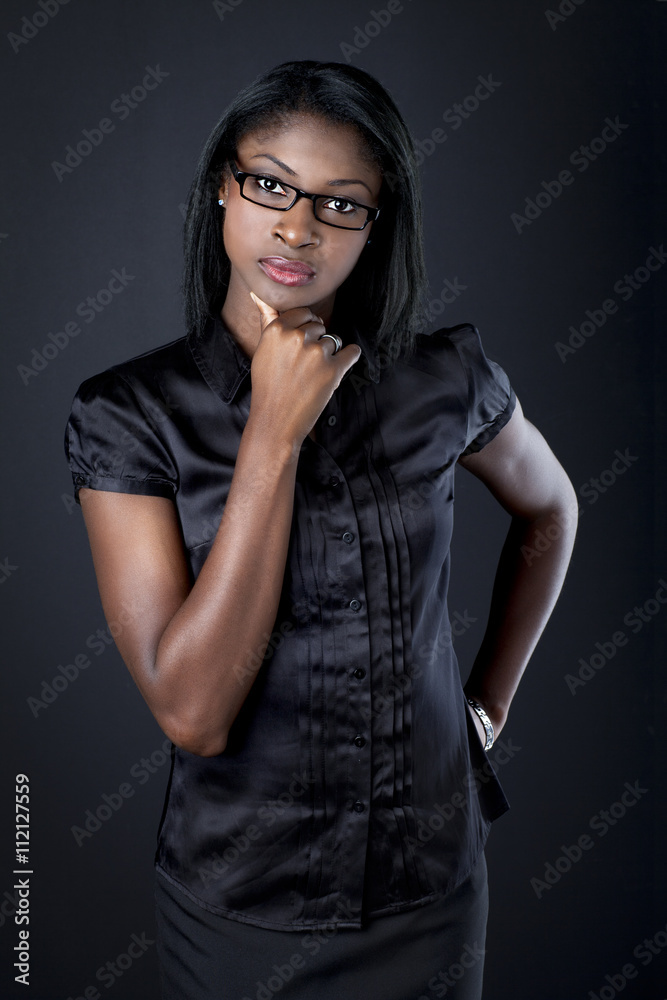 confident young businesswoman with hand on chin. confident young businesswoman with hand on chin.