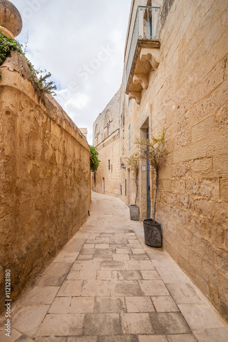 Fototapeta Naklejka Na Ścianę i Meble -  Silent and magical alley in Mdina, Malta