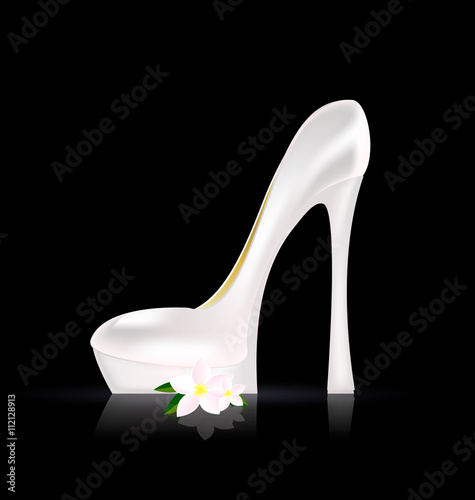 white shoe and flower