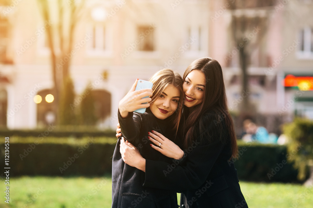 Fototapeta premium Two young adult girls