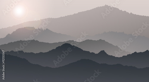 Wonderful sunrise mountain landscape the summer in the fog