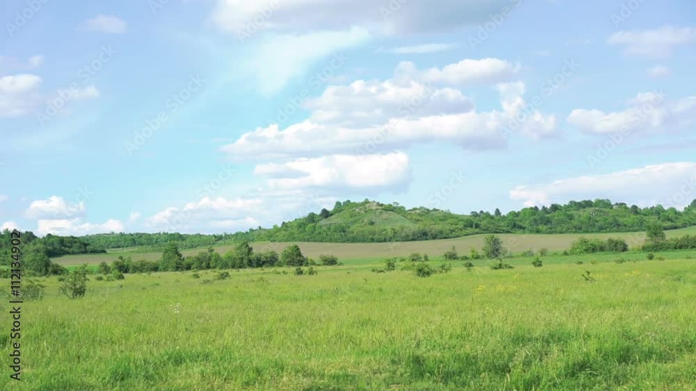 Background of green mountains, grass and sky Background of green mountains, grass and sky