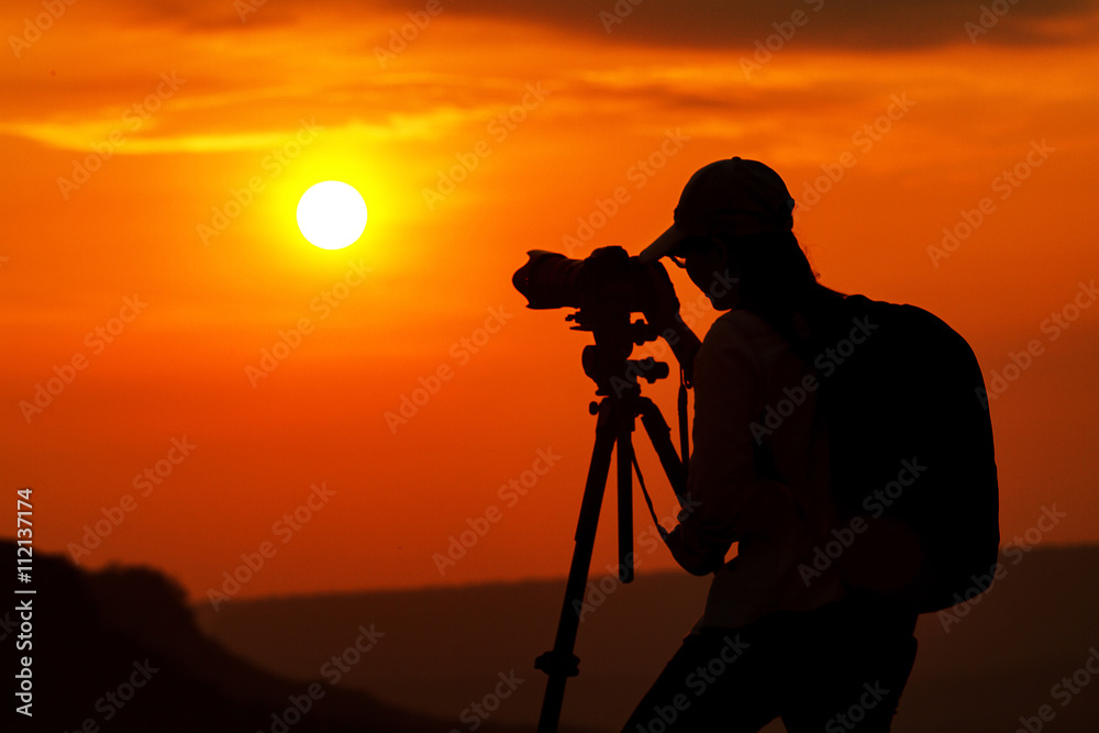 silhouette of asian women photography take a photo with mountain