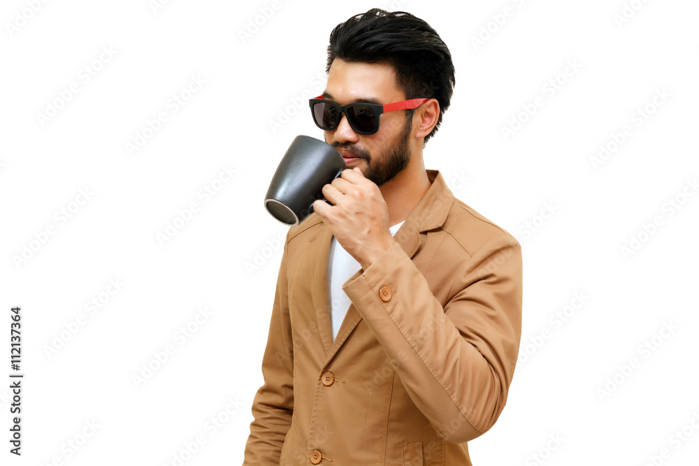 Portrait of a handsome asian young businessman drinking coffee. Portrait of a handsome asian young businessman drinking coffee.