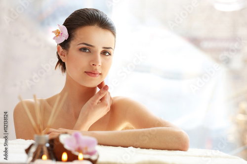 Young woman with flower rel...