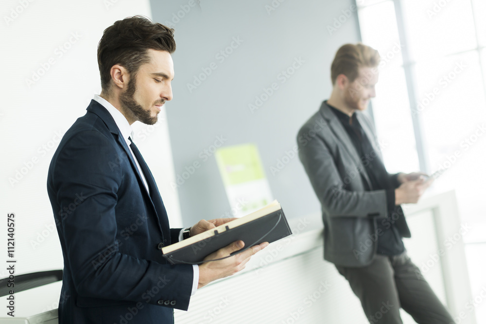 Young men in the office Young men in the office