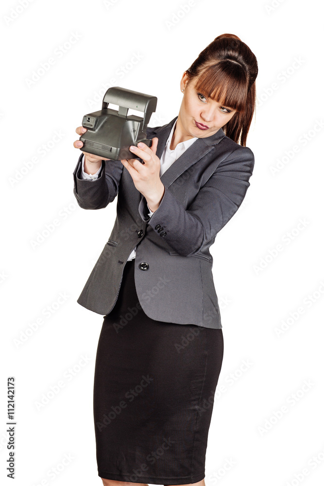 woman taking selfie on retro camera. isolated on white background woman taking selfie on retro camera. isolated on white background