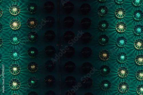 Amusement park detail with green lights
