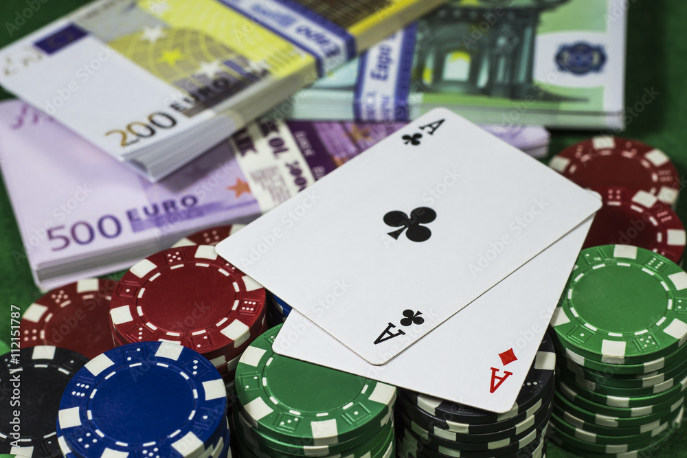 Fototapeta premium Poker chips with a lot of euros and card