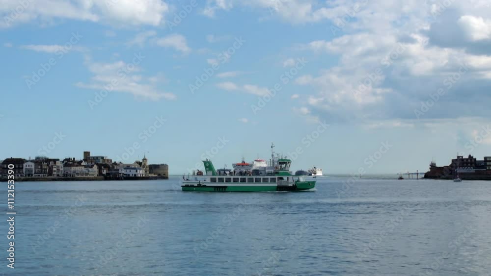 Several boats and ships at the entrance of the harbour of Portsmouth Several boats and ships at the entrance of the harbour of Portsmouth