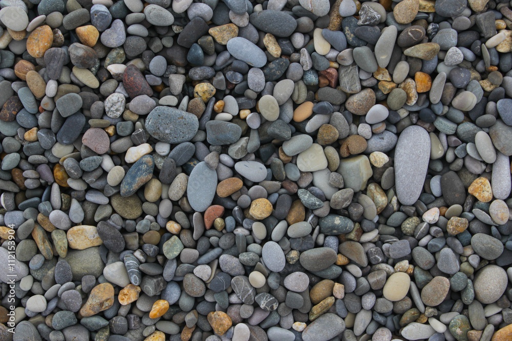 stones background. wall pattern of gravel stone stones background. wall pattern of gravel stone
