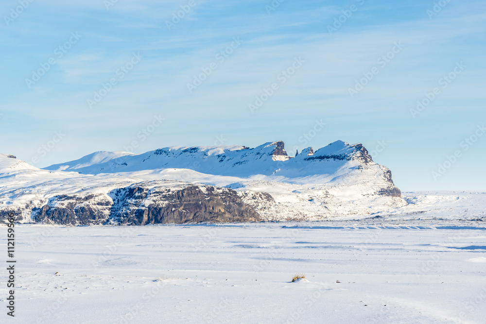 Winter rural Icelandic mountains landscape