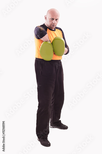 Trainer holding focus mitts