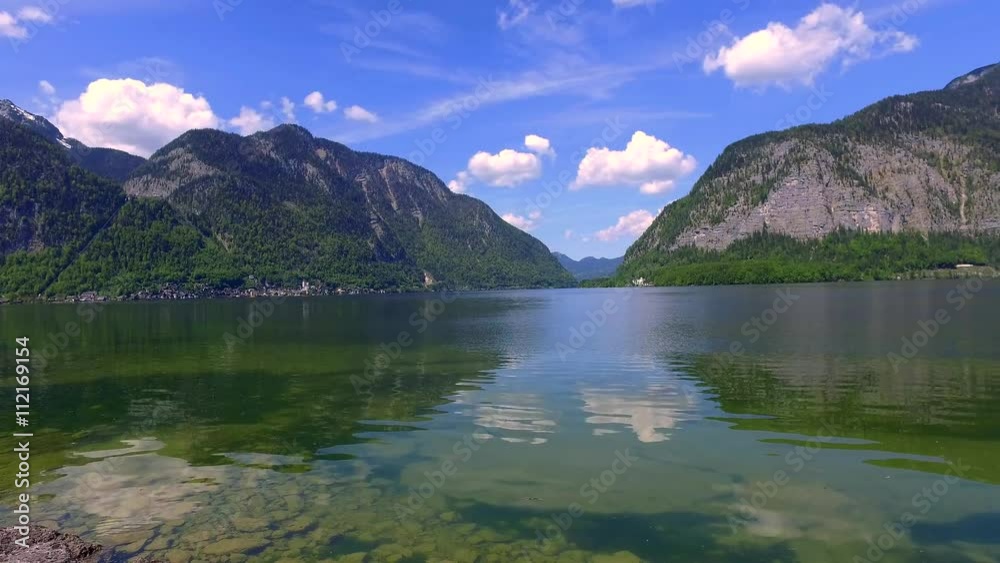 Mountain lake in Hallstatt in summer, Alps Mountain lake in Hallstatt in summer, Alps